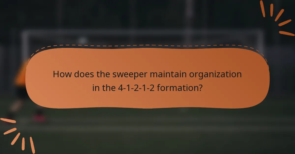 How does the sweeper maintain organization in the 4-1-2-1-2 formation?